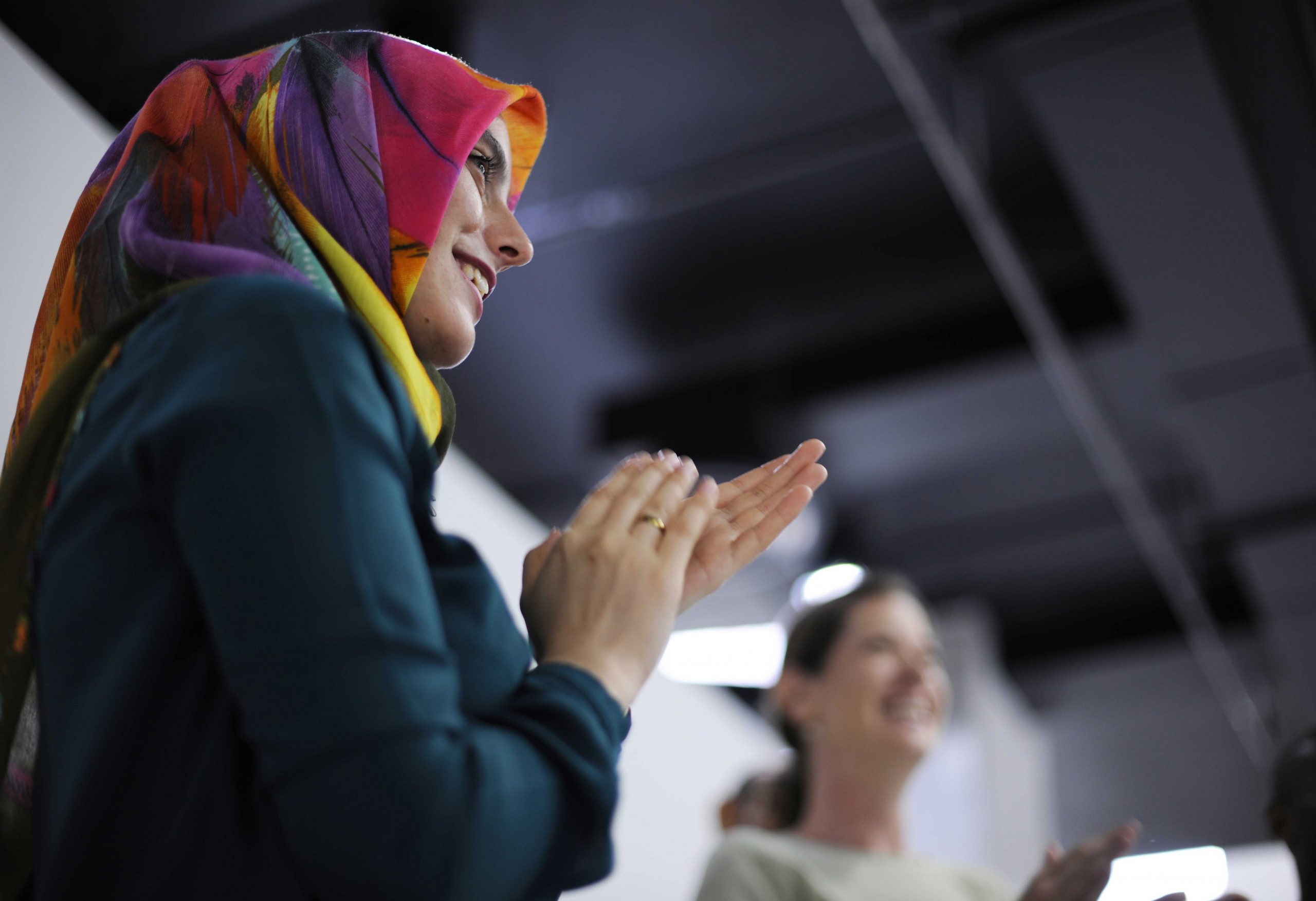 Arab businesswoman applauding